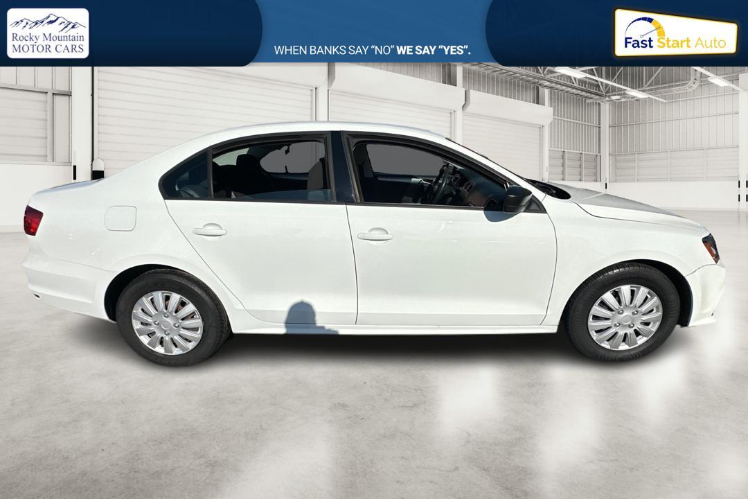 2015 White Volkswagen Jetta SE 5M (3VWD17AJ0FM) with an 1.8L L4 DOHC 20V engine, 5-Speed Manual transmission, located at 767 S State Road, Pleasant Grove, UT, 84062, (801) 785-1058, 40.354839, -111.736687 - Photo #1