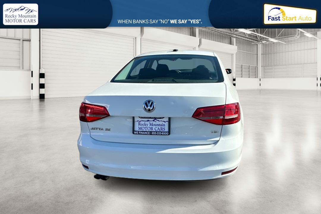 2015 White Volkswagen Jetta SE 5M (3VWD17AJ0FM) with an 1.8L L4 DOHC 20V engine, 5-Speed Manual transmission, located at 767 S State Road, Pleasant Grove, UT, 84062, (801) 785-1058, 40.354839, -111.736687 - Photo #3