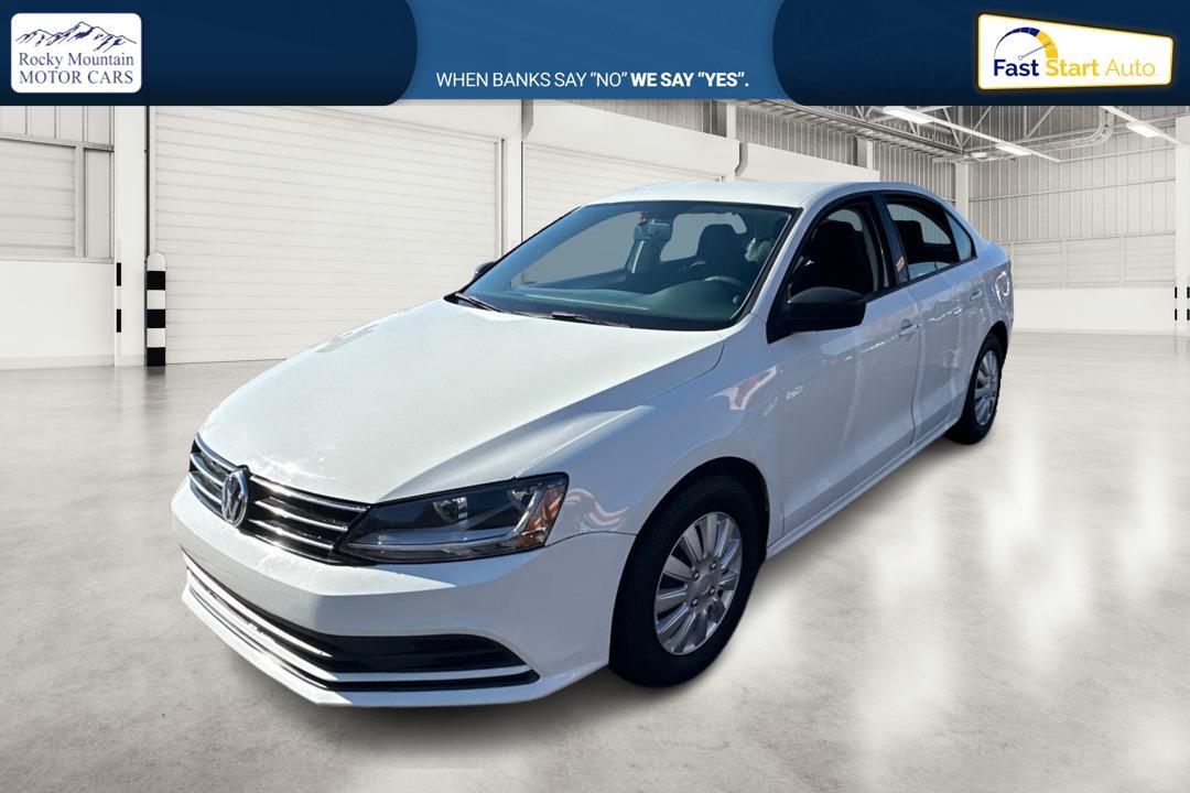 2015 White Volkswagen Jetta SE 5M (3VWD17AJ0FM) with an 1.8L L4 DOHC 20V engine, 5-Speed Manual transmission, located at 767 S State Road, Pleasant Grove, UT, 84062, (801) 785-1058, 40.354839, -111.736687 - Photo #5