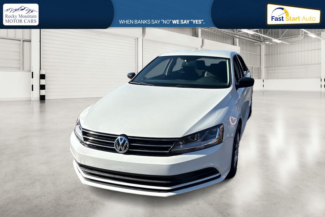 2015 White Volkswagen Jetta SE 5M (3VWD17AJ0FM) with an 1.8L L4 DOHC 20V engine, 5-Speed Manual transmission, located at 767 S State Road, Pleasant Grove, UT, 84062, (801) 785-1058, 40.354839, -111.736687 - Photo #6