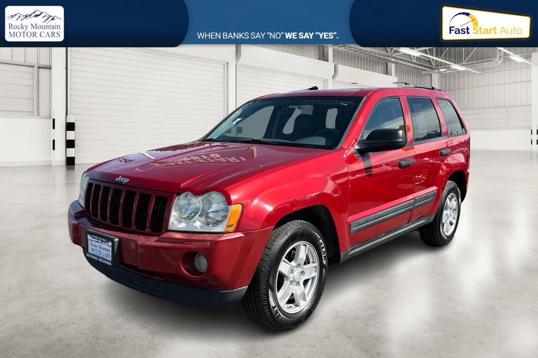 2005 Red Jeep Grand Cherokee Laredo 2WD (1J8HS48N25C) with an 4.7L V8 SOHC 16V engine, 5-Speed Automatic Overdrive transmission, located at 7755 State Street, Midvale, UT, 84047, (801) 753-9063, 40.610329, -111.890656 - Photo #6