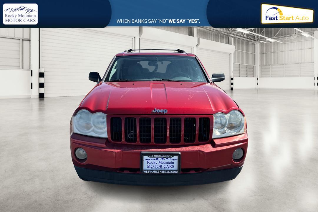2005 Red Jeep Grand Cherokee Laredo 2WD (1J8HS48N25C) with an 4.7L V8 SOHC 16V engine, 5-Speed Automatic Overdrive transmission, located at 7755 State Street, Midvale, UT, 84047, (801) 753-9063, 40.610329, -111.890656 - Photo #7
