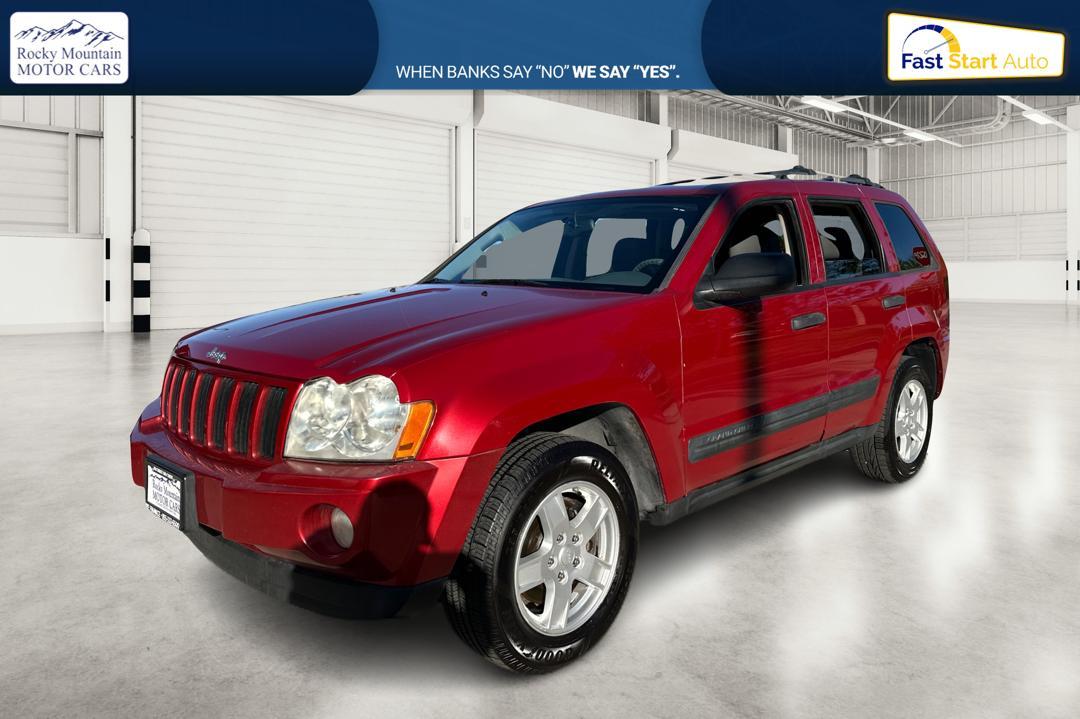 2005 Red Jeep Grand Cherokee Laredo 2WD (1J8HS48N25C) with an 4.7L V8 SOHC 16V engine, 5-Speed Automatic Overdrive transmission, located at 7755 State Street, Midvale, UT, 84047, (801) 753-9063, 40.610329, -111.892159 - Photo #6