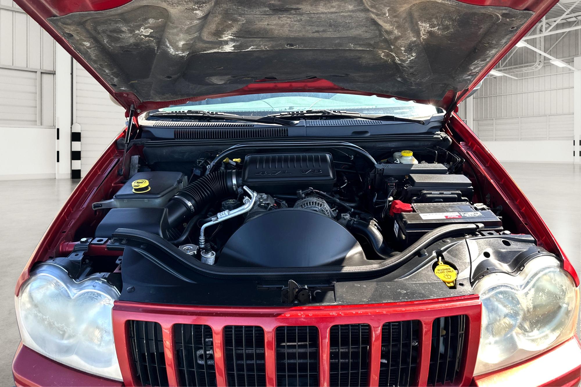2005 Red Jeep Grand Cherokee Laredo 2WD (1J8HS48N25C) with an 4.7L V8 SOHC 16V engine, 5-Speed Automatic Overdrive transmission, located at 7755 State Street, Midvale, UT, 84047, (801) 753-9063, 40.610329, -111.890656 - Photo #8