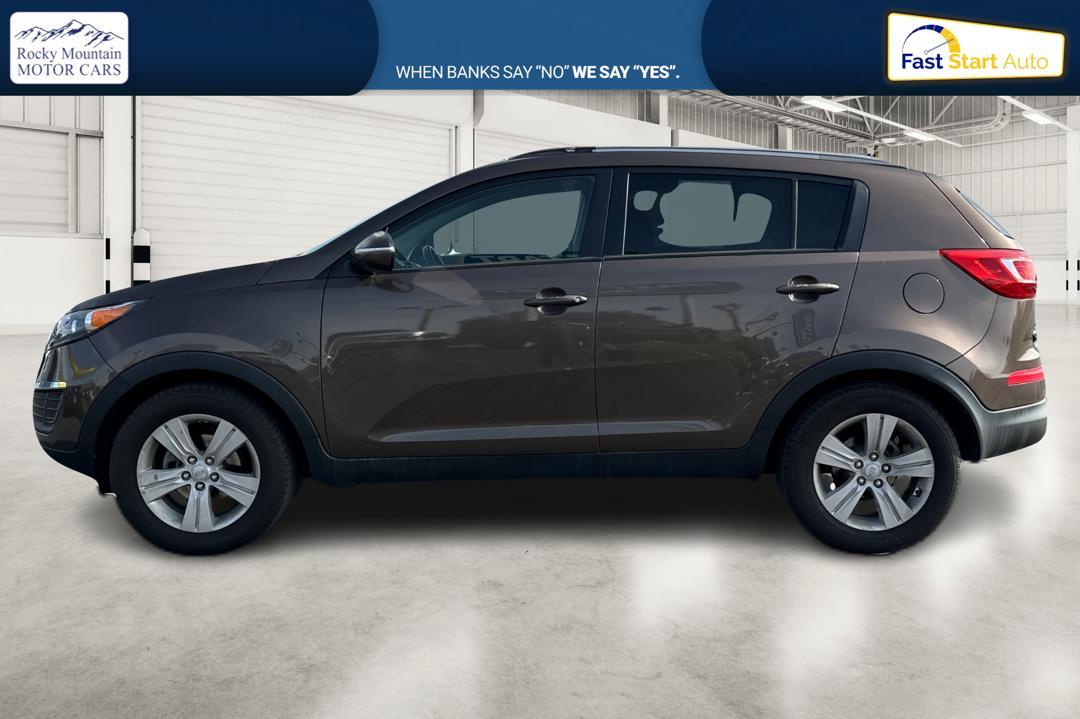 2011 Beige Kia Sportage LX FWD (KNDPB3A20B7) with an 2.4L V6 DOHC 24V engine, AUTOMATIC transmission, located at 7755 State Street, Midvale, UT, 84047, (801) 753-9063, 40.610329, -111.892159 - Photo #5
