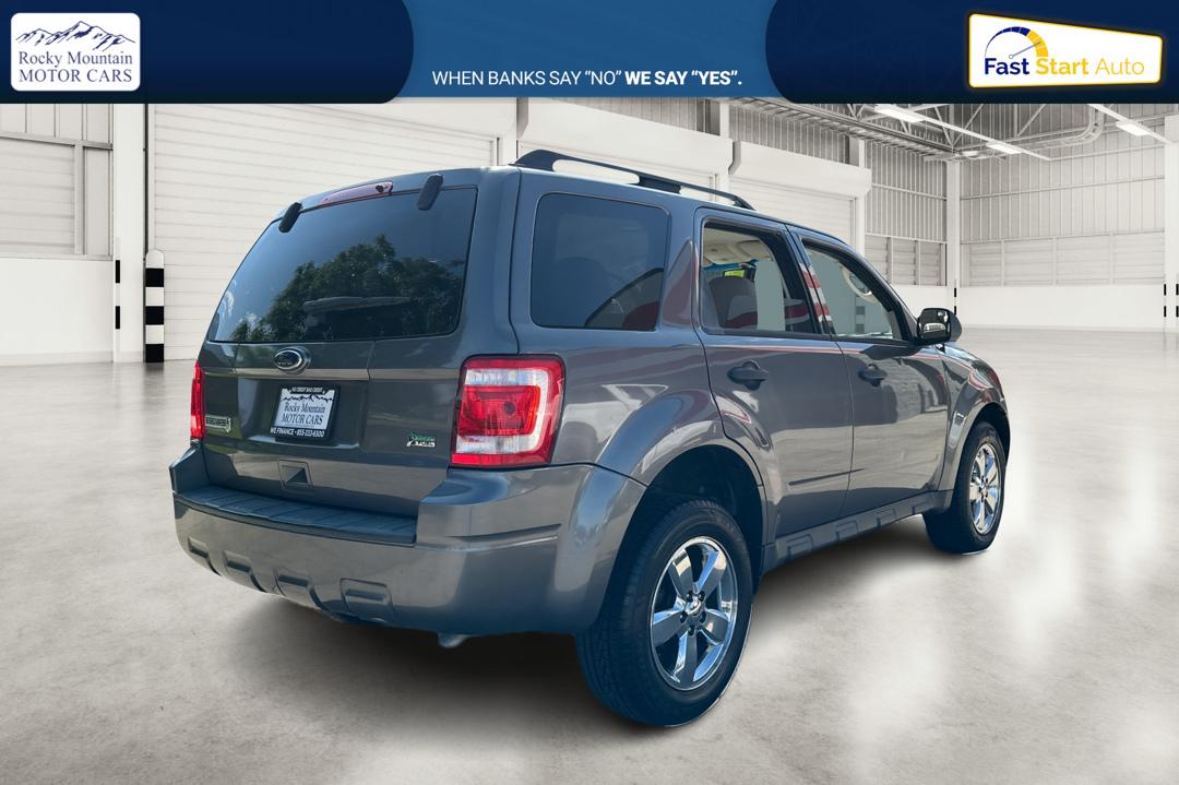 2010 Gray Ford Escape XLT FWD (1FMCU0DG3AK) with an 3.0L V6 DOHC 24V engine, 6-Speed Automatic transmission, located at 767 S State Road, Pleasant Grove, UT, 84062, (801) 785-1058, 40.354839, -111.736687 - Photo#2