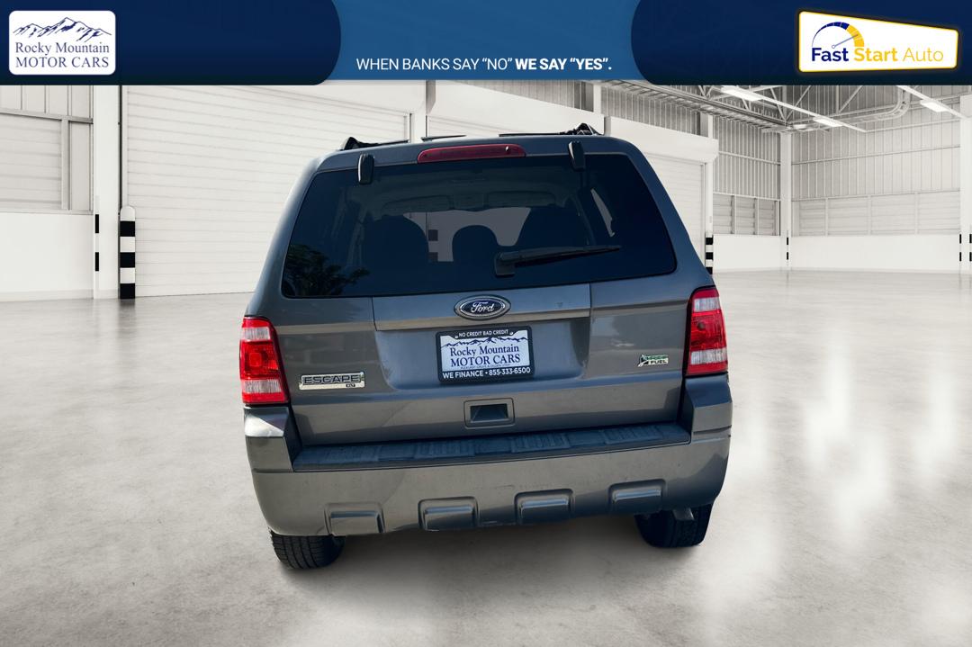 2010 Gray Ford Escape XLT FWD (1FMCU0DG3AK) with an 3.0L V6 DOHC 24V engine, 6-Speed Automatic transmission, located at 767 S State Road, Pleasant Grove, UT, 84062, (801) 785-1058, 40.354839, -111.736687 - Photo#4
