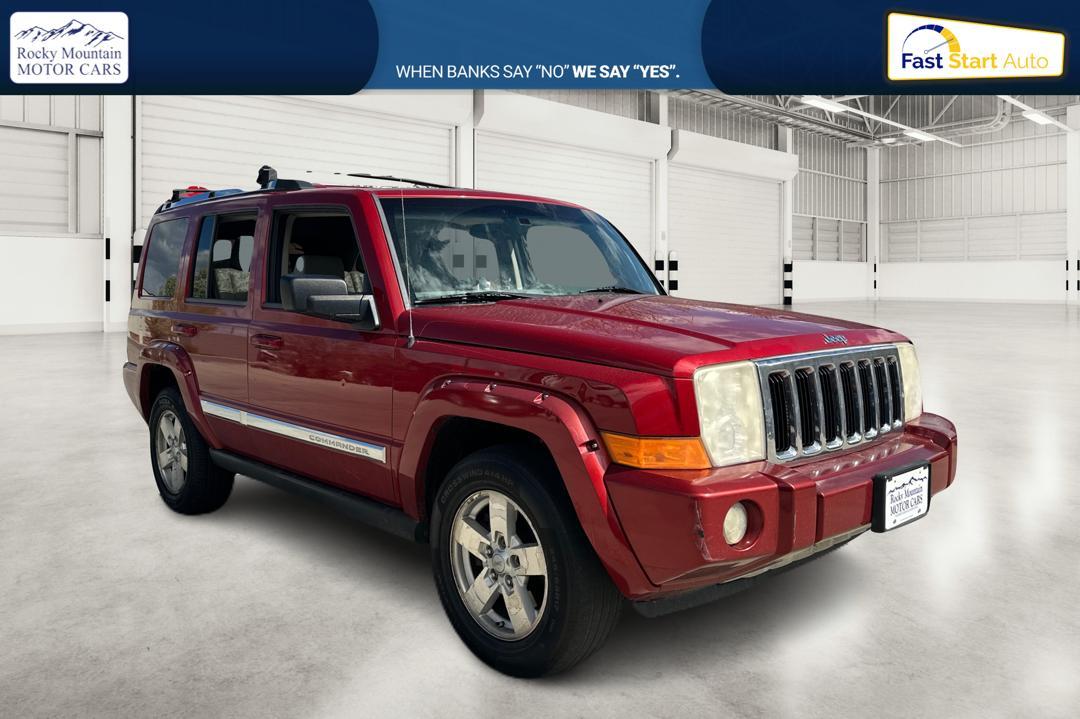 2006 Red Jeep Commander Limited 4WD (1J8HG58N96C) with an 4.7L V8 SOHC 16V engine, 5-Speed Automatic Overdrive transmission, located at 767 S State Road, Pleasant Grove, UT, 84062, (801) 785-1058, 40.354839, -111.736687 - Photo #0