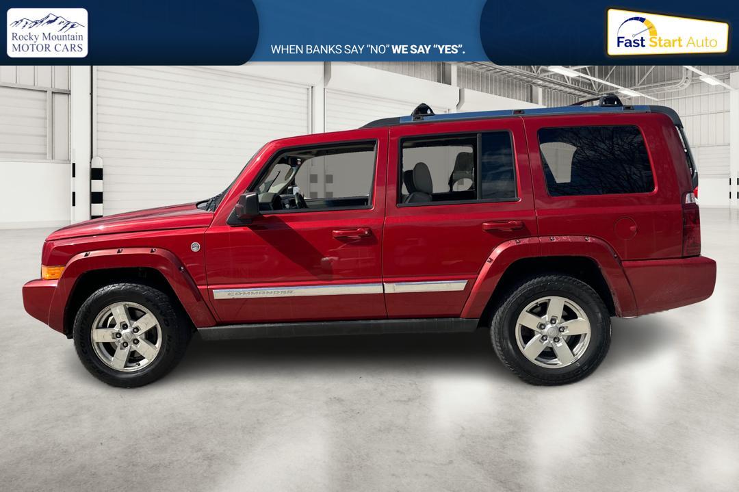 2006 Red Jeep Commander Limited 4WD (1J8HG58N96C) with an 4.7L V8 SOHC 16V engine, 5-Speed Automatic Overdrive transmission, located at 767 S State Road, Pleasant Grove, UT, 84062, (801) 785-1058, 40.354839, -111.736687 - Photo #5