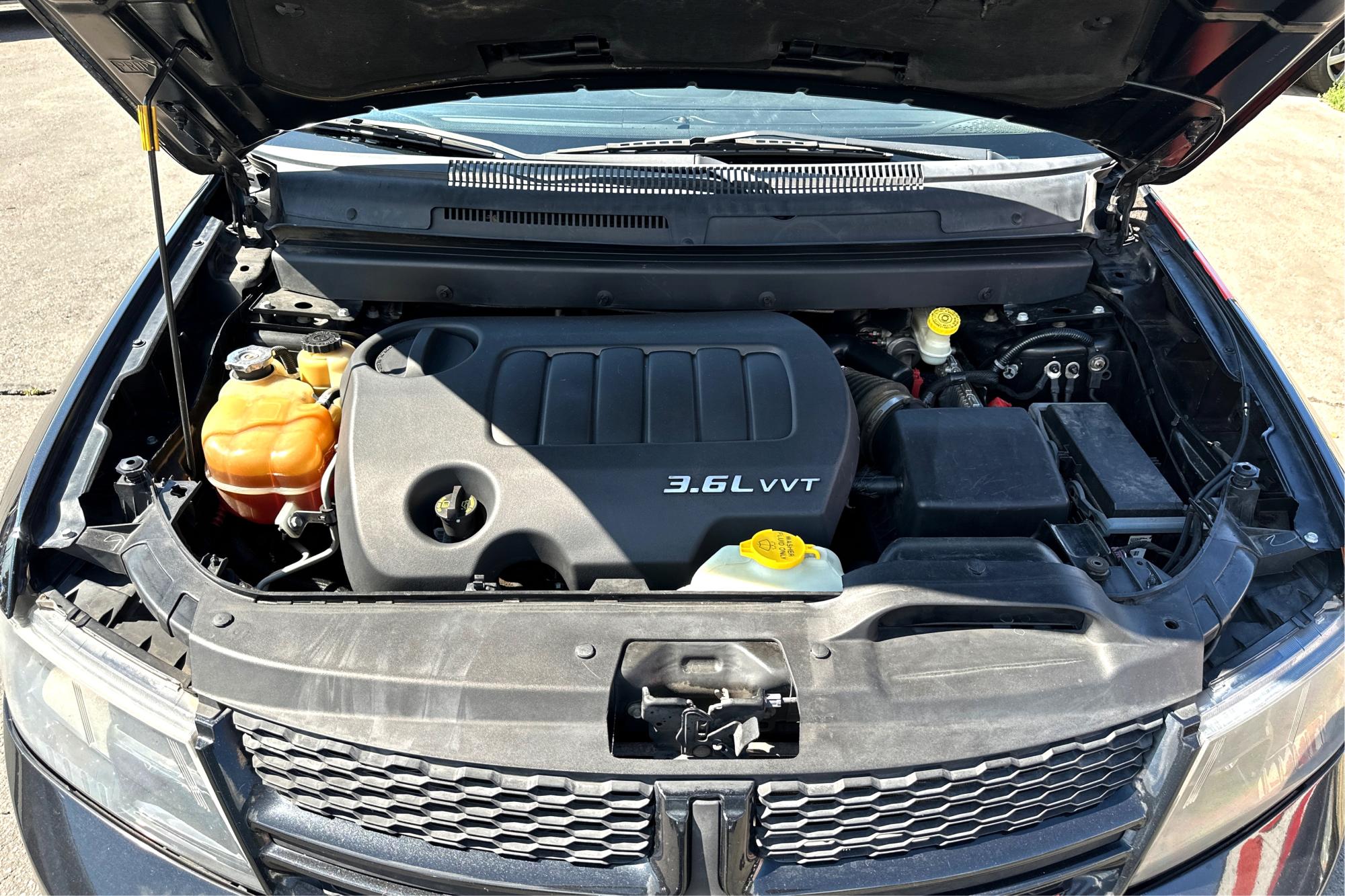 2013 Black Dodge Journey SXT (3C4PDCBGXDT) with an 3.6L V6 DOHC 24V engine, 6-Speed Automatic transmission, located at 7755 State Street, Midvale, UT, 84047, (801) 753-9063, 40.610329, -111.890656 - Photo #8