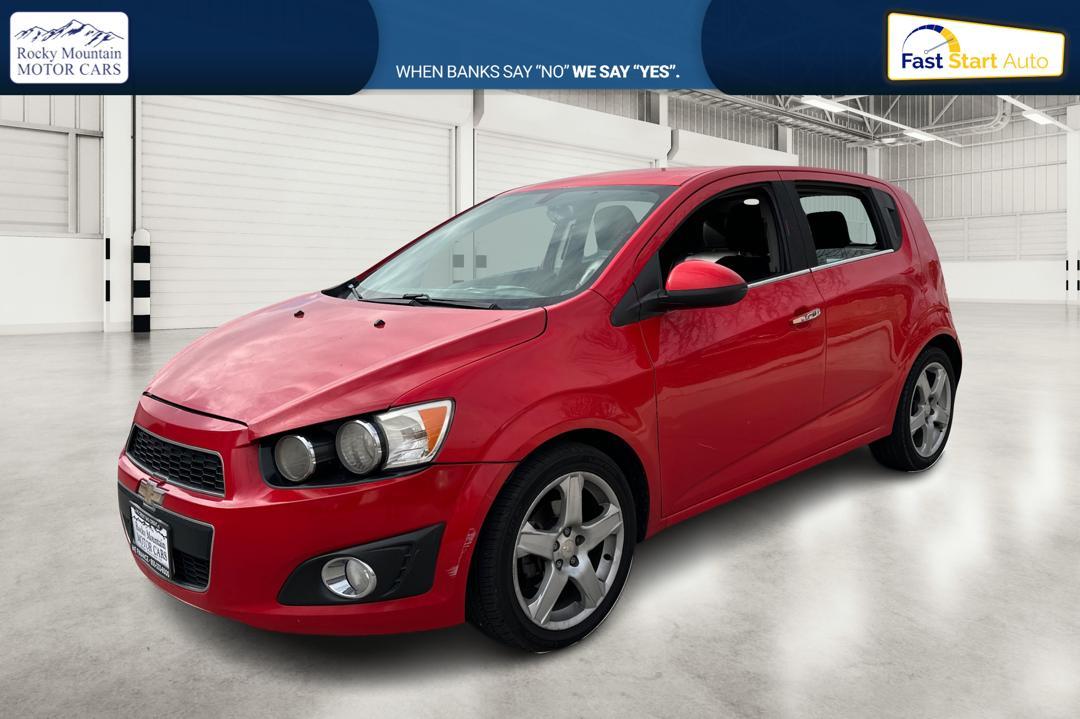 2015 Red Chevrolet Sonic LTZ Auto 5-Door (1G1JE6SB1F4) with an 1.4L L4 DOHC 24V TURBO engine, 6-Speed Automatic transmission, located at 767 S State Road, Pleasant Grove, UT, 84062, (801) 785-1058, 40.354839, -111.736687 - Photo#8