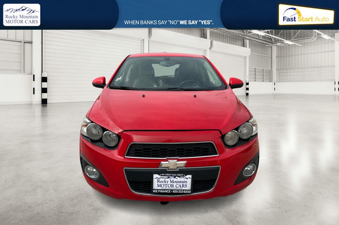 2015 Red Chevrolet Sonic LTZ Auto 5-Door (1G1JE6SB1F4) with an 1.4L L4 DOHC 24V TURBO engine, 6-Speed Automatic transmission, located at 767 S State Road, Pleasant Grove, UT, 84062, (801) 785-1058, 40.354839, -111.736687 - Photo#9