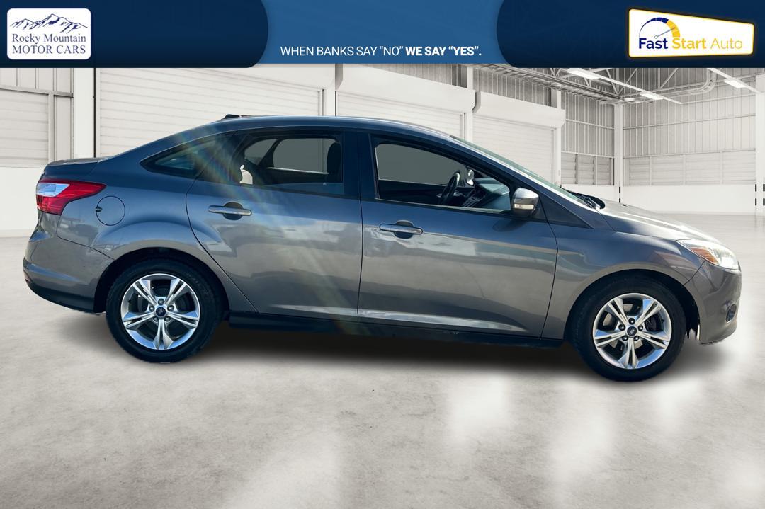 2013 Gray Ford Focus SE Sedan (1FADP3F26DL) with an 2.0L L4 DOHC 16V engine, Auto 6Spd PwrShft SelShft transmission, located at 7755 State Street, Midvale, UT, 84047, (801) 753-9063, 40.610329, -111.890656 - Photo #1