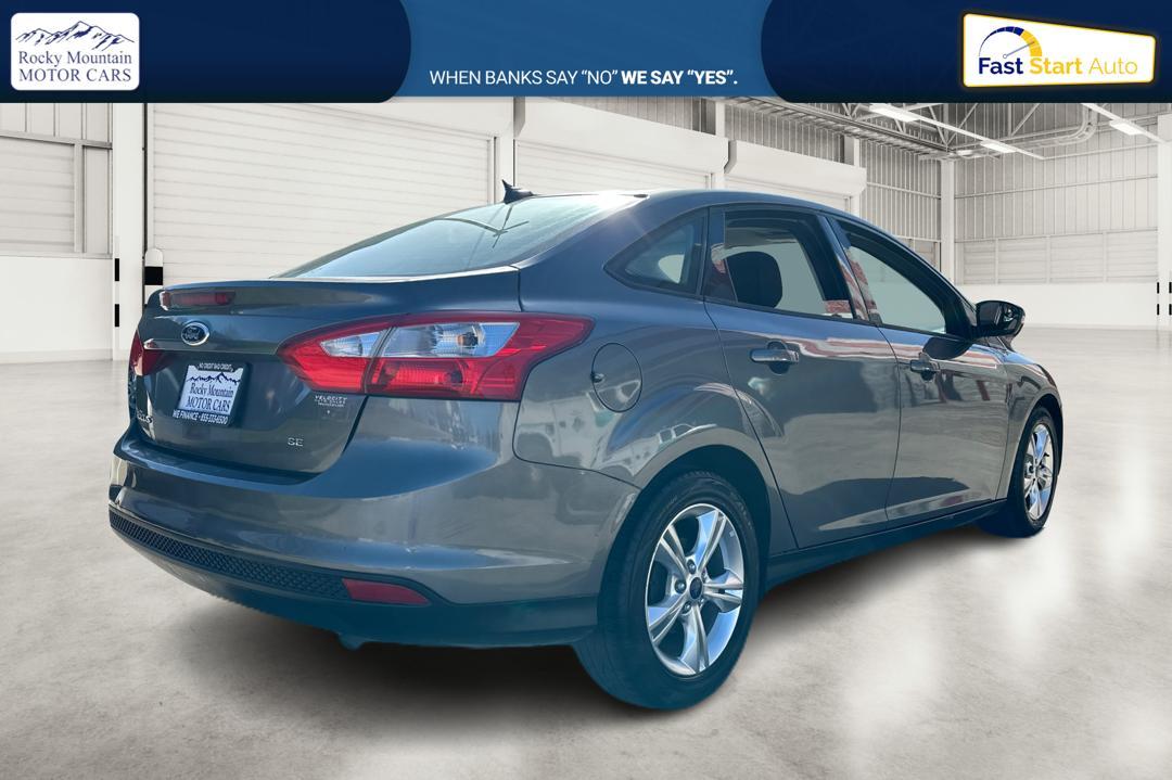 2013 Gray Ford Focus SE Sedan (1FADP3F26DL) with an 2.0L L4 DOHC 16V engine, Auto 6Spd PwrShft SelShft transmission, located at 7755 State Street, Midvale, UT, 84047, (801) 753-9063, 40.610329, -111.890656 - Photo #2