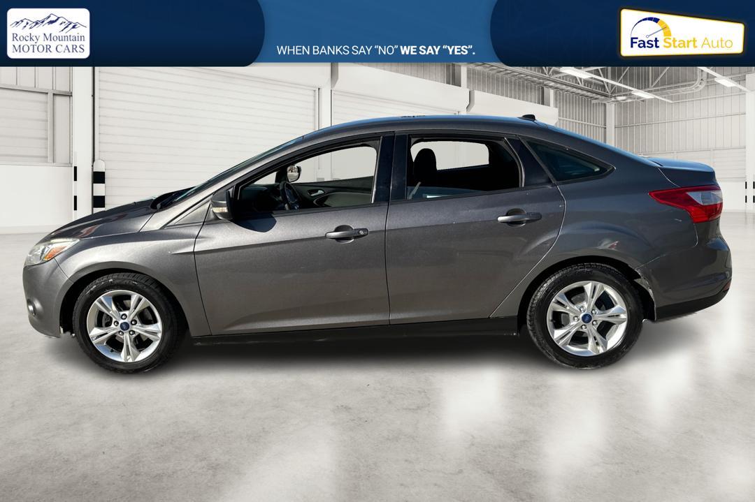 2013 Gray Ford Focus SE Sedan (1FADP3F26DL) with an 2.0L L4 DOHC 16V engine, Auto 6Spd PwrShft SelShft transmission, located at 7755 State Street, Midvale, UT, 84047, (801) 753-9063, 40.610329, -111.892159 - Photo #5