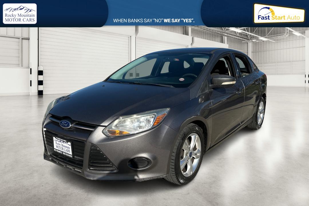 2013 Gray Ford Focus SE Sedan (1FADP3F26DL) with an 2.0L L4 DOHC 16V engine, Auto 6Spd PwrShft SelShft transmission, located at 7755 State Street, Midvale, UT, 84047, (801) 753-9063, 40.610329, -111.890656 - Photo #6