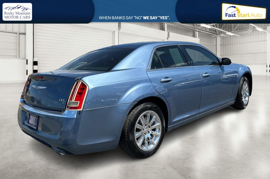 2011 Blue Chrysler 300 C RWD (2C3CA6CT5BH) with an 5.7L V8 OHV 16V engine, 5-Speed Automatic transmission, located at 7755 State Street, Midvale, UT, 84047, (801) 753-9063, 40.610329, -111.890656 - Photo #2