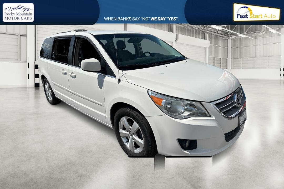 2011 White Volkswagen Routan SE (2V4RW3DG8BR) with an 3.6L V6 DOHC 24V engine, 6-Speed Automatic transmission, located at 767 S State Road, Pleasant Grove, UT, 84062, 40.330902, -76.919098 - Photo #0