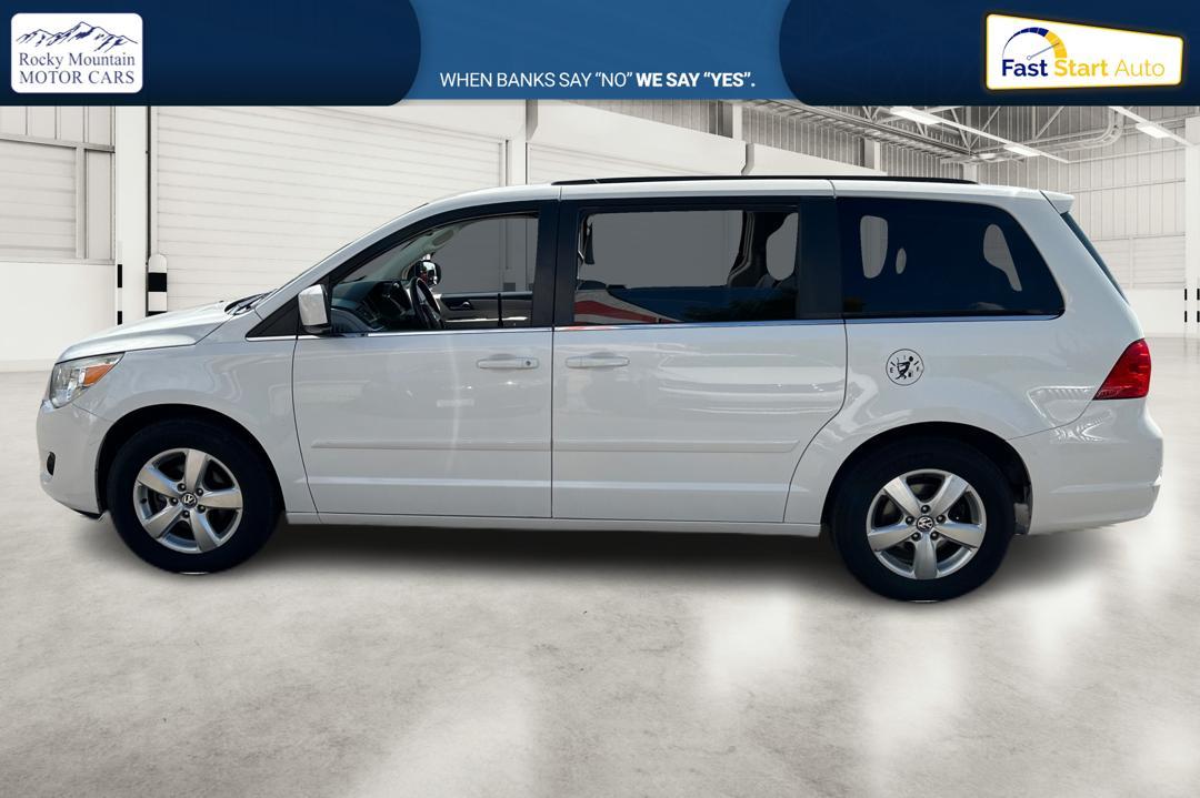 2011 White Volkswagen Routan SE (2V4RW3DG8BR) with an 3.6L V6 DOHC 24V engine, 6-Speed Automatic transmission, located at 767 S State Road, Pleasant Grove, UT, 84062, (801) 785-1058, 40.352489, -111.732628 - Photo #5