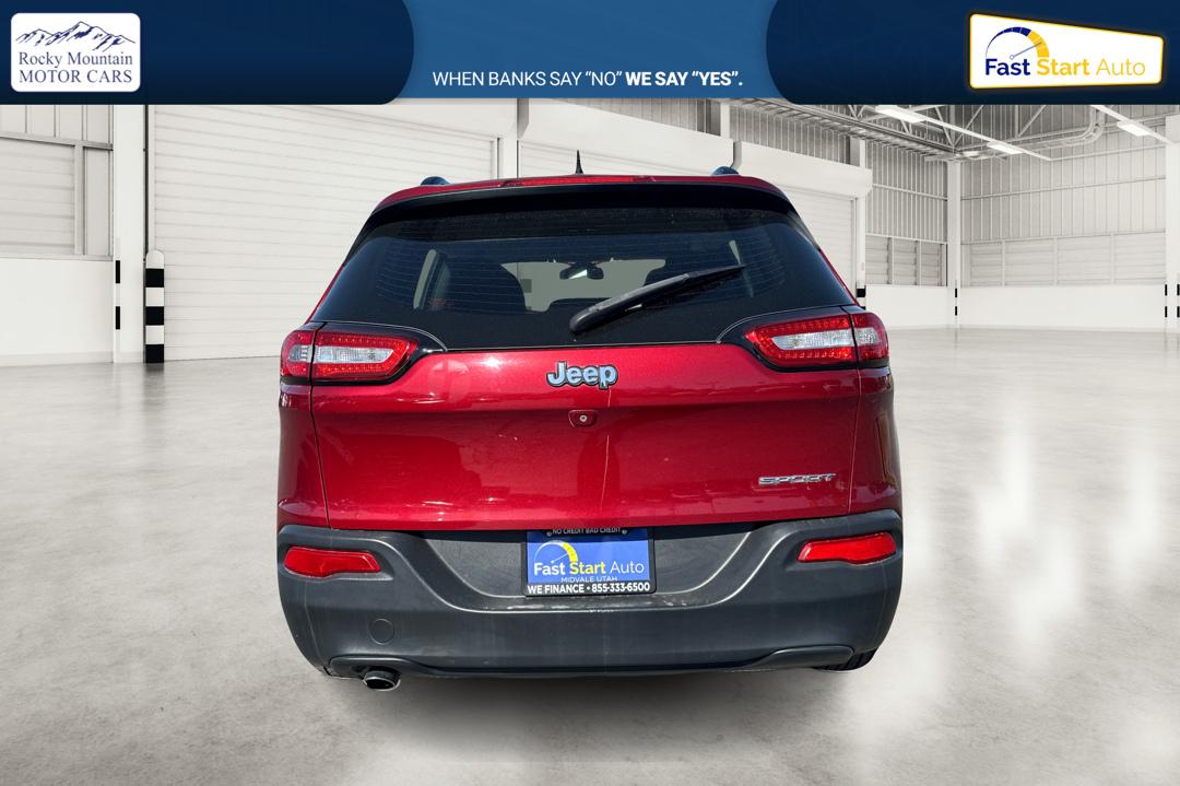 2015 Red Jeep Cherokee Sport FWD (1C4PJLAB8FW) with an 2.4L L4 DOHC 16V engine, 9-Speed Automatic transmission, located at 7755 State Street, Midvale, UT, 84047, (801) 753-9063, 40.610329, -111.892159 - Photo#4