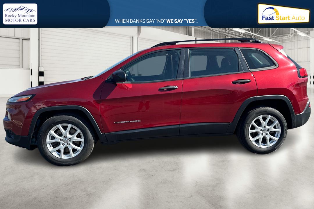 2015 Red Jeep Cherokee Sport FWD (1C4PJLAB8FW) with an 2.4L L4 DOHC 16V engine, 9-Speed Automatic transmission, located at 7755 State Street, Midvale, UT, 84047, (801) 753-9063, 40.610329, -111.892159 - Photo#6