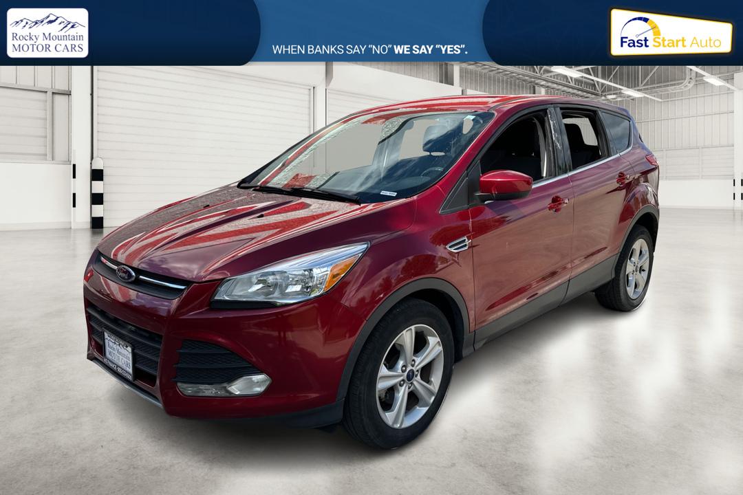 2016 Red Ford Escape SE FWD (1FMCU0G79GU) with an 2.5L L4 DOHC 16V engine, 6-Speed Automatic transmission, located at 767 S State Road, Pleasant Grove, UT, 84062, (801) 785-1058, 40.354839, -111.736687 - Photo#8