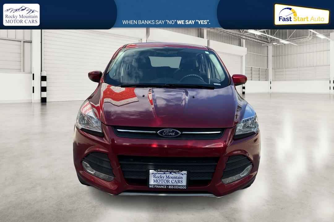 2016 Red Ford Escape SE FWD (1FMCU0G79GU) with an 2.5L L4 DOHC 16V engine, 6-Speed Automatic transmission, located at 767 S State Road, Pleasant Grove, UT, 84062, (801) 785-1058, 40.354839, -111.736687 - Photo#9