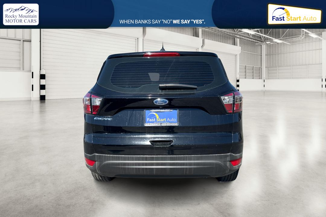 2017 Black Ford Escape S FWD (1FMCU0F75HU) with an 2.5L L4 DOHC 16V engine, 6A transmission, located at 7755 State Street, Midvale, UT, 84047, (801) 753-9063, 40.610329, -111.892159 - Photo#4