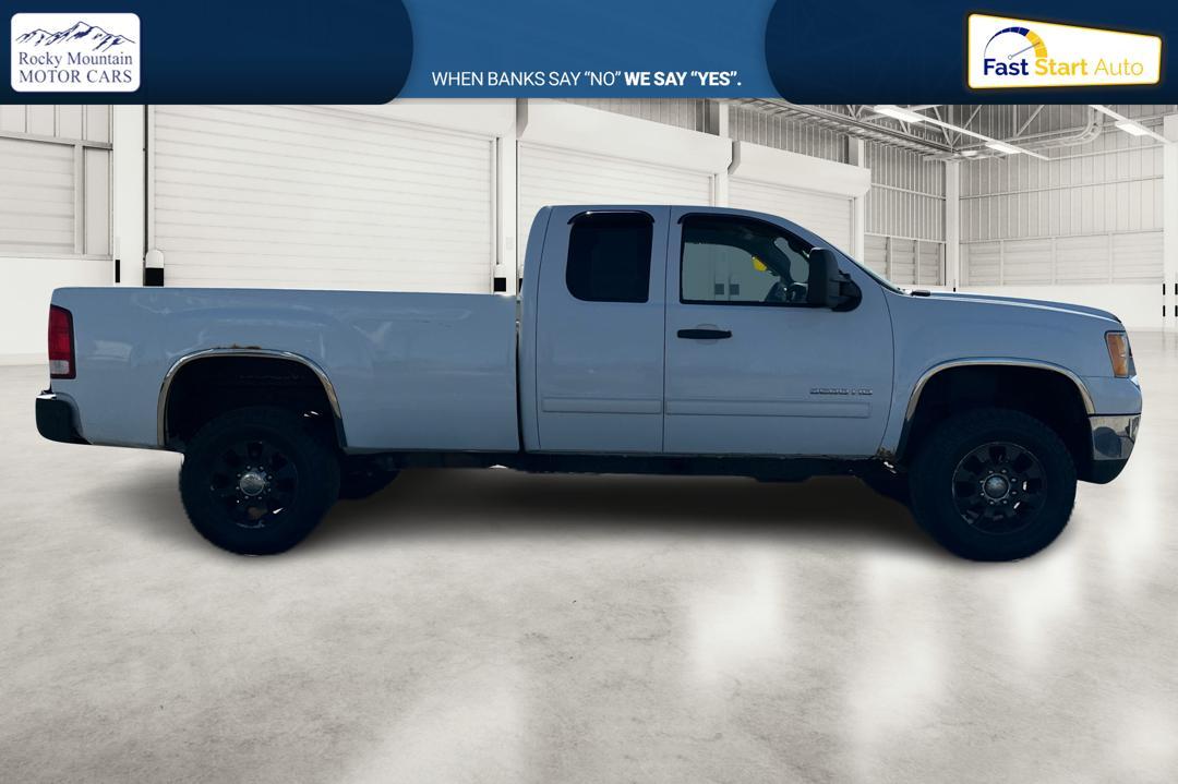 2011 White GMC Sierra 3500HD SLE Ext. Cab Long Box 4WD (1GT523CG7BZ) with an 6.0L V8 OHV 16V FFV engine, 6-Speed Automatic transmission, located at 7755 State Street, Midvale, UT, 84047, (801) 753-9063, 40.610329, -111.892159 - Photo #1