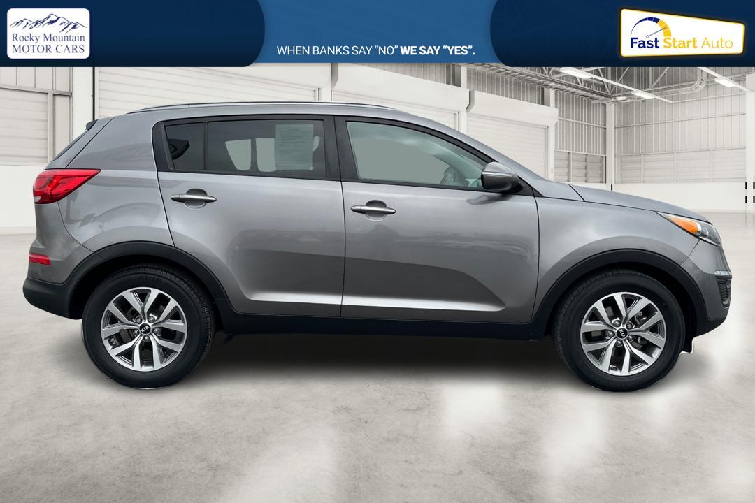 2015 Silver Kia Sportage LX FWD (KNDPB3AC7F7) with an 2.4L V6 DOHC 24V engine, 6-Speed Automatic transmission, located at 344 S Washington Blvd, Ogden, UT, 84404, (801) 399-1799, 41.255482, -111.970848 - Photo#1