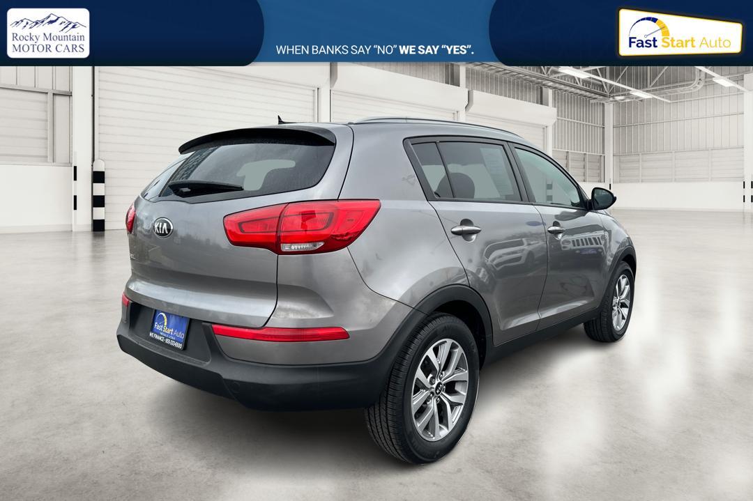 2015 Silver Kia Sportage LX FWD (KNDPB3AC7F7) with an 2.4L V6 DOHC 24V engine, 6-Speed Automatic transmission, located at 344 S Washington Blvd, Ogden, UT, 84404, (801) 399-1799, 41.255482, -111.970848 - Photo#2