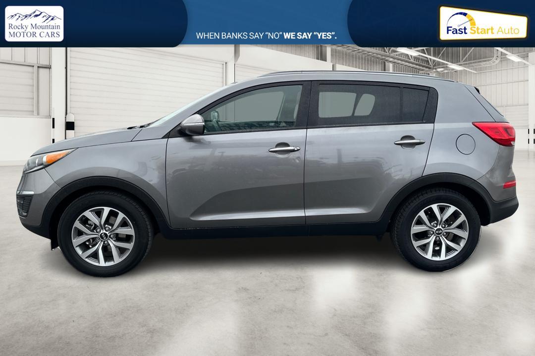 2015 Silver Kia Sportage LX FWD (KNDPB3AC7F7) with an 2.4L V6 DOHC 24V engine, 6-Speed Automatic transmission, located at 344 S Washington Blvd, Ogden, UT, 84404, (801) 399-1799, 41.255482, -111.970848 - Photo#6