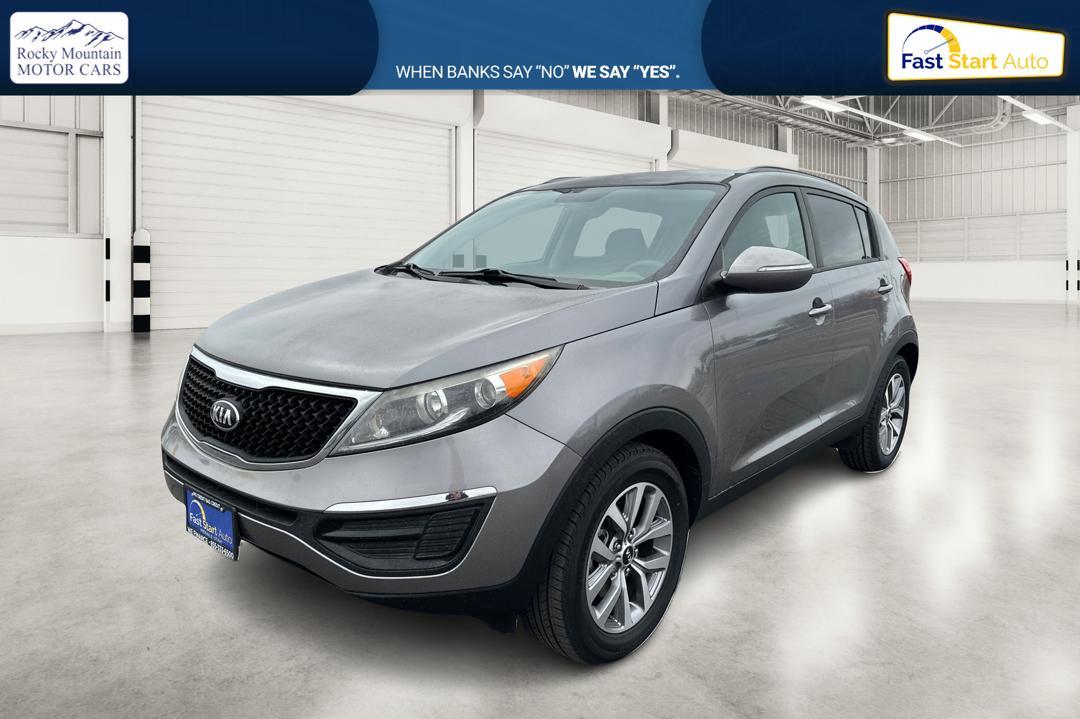 2015 Silver Kia Sportage LX FWD (KNDPB3AC7F7) with an 2.4L V6 DOHC 24V engine, 6-Speed Automatic transmission, located at 344 S Washington Blvd, Ogden, UT, 84404, (801) 399-1799, 41.255482, -111.970848 - Photo#8
