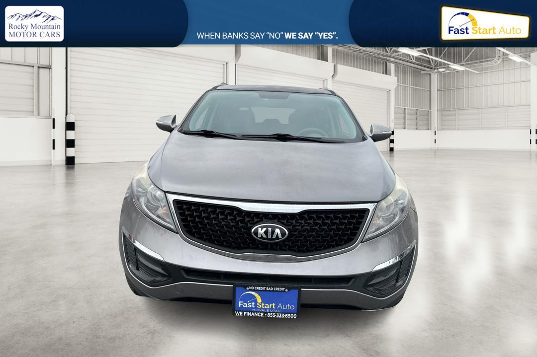2015 Silver Kia Sportage LX FWD (KNDPB3AC7F7) with an 2.4L V6 DOHC 24V engine, 6-Speed Automatic transmission, located at 344 S Washington Blvd, Ogden, UT, 84404, (801) 399-1799, 41.255482, -111.970848 - Photo#9