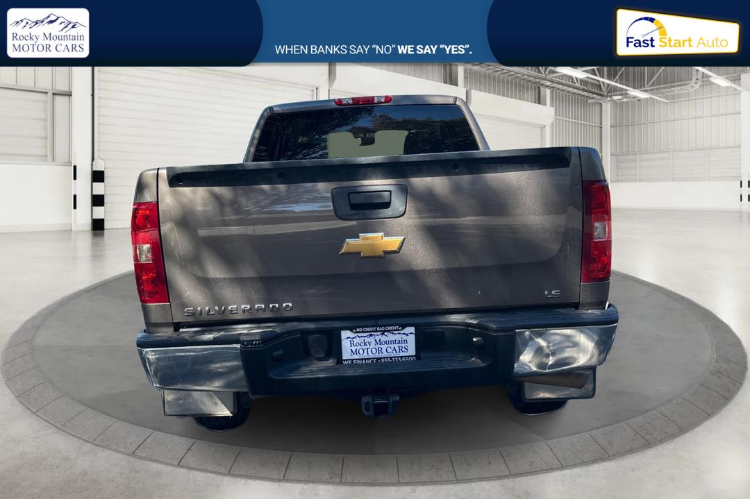 2013 Gray Chevrolet Silverado 1500 LS Extended Cab 4WD (1GCRKREA9DZ) with an 4.8L V8 OHV 16V engine, 4-Speed Automatic transmission, located at 767 S State Road, Pleasant Grove, UT, 84062, (801) 785-1058, 40.354839, -111.736687 - Photo#3