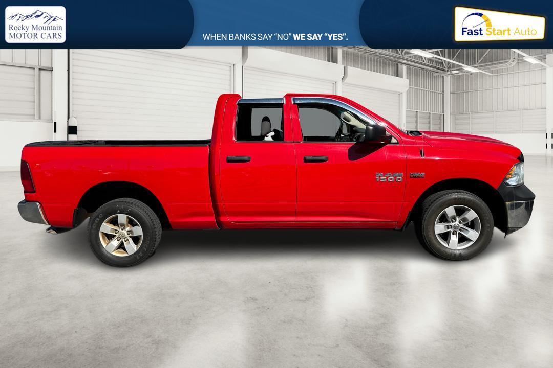 2016 Red RAM 1500 Tradesman Quad Cab 4WD (1C6RR7FT4GS) with an 5.7L V8 OHV 16V engine, 6A transmission, located at 767 S State Road, Pleasant Grove, UT, 84062, (801) 785-1058, 40.352489, -111.732628 - Photo #1