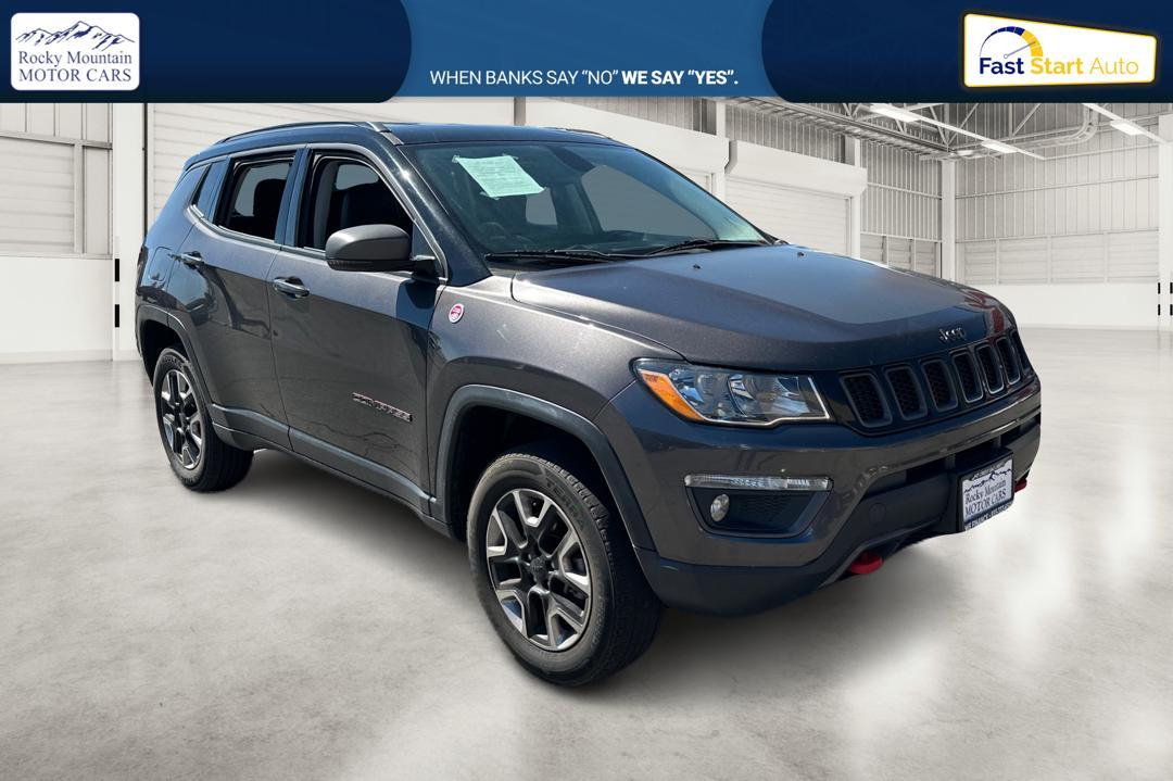 2018 Gray Jeep Compass Limited 4WD (3C4NJDDB2JT) with an 2.4L L4 DOHC 16V engine, CVT transmission, located at 767 S State Road, Pleasant Grove, UT, 84062, (801) 785-1058, 40.352489, -111.732628 - Photo #0