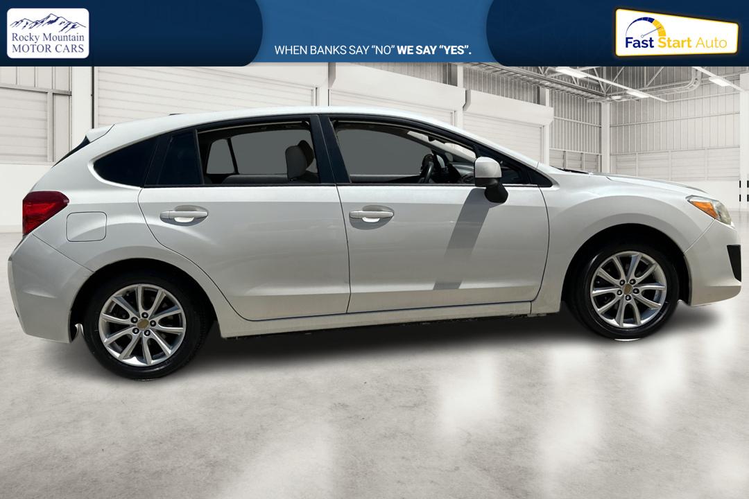 2014 White Subaru Impreza 2.0i Premium 5-Door w/All Weather Package (JF1GPAC66EH) with an 2.0L H4 DOHC 16V engine, Continuously Variable Transmission transmission, located at 767 S State Road, Pleasant Grove, UT, 84062, (801) 785-1058, 40.354839, -111.736687 - Photo#1