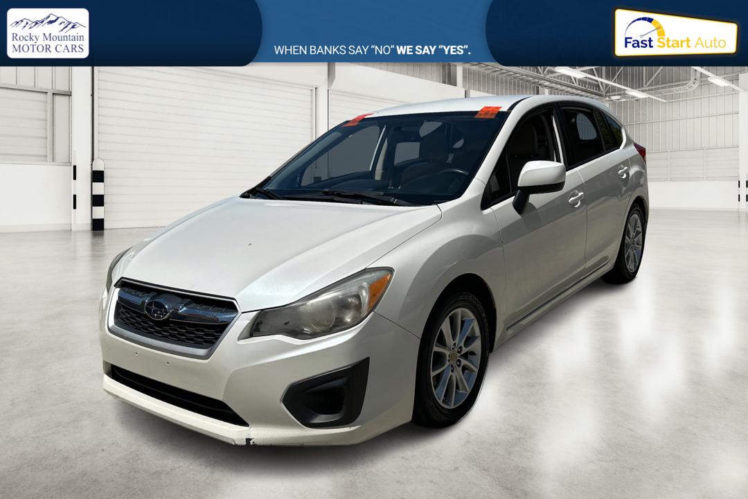 2014 White Subaru Impreza 2.0i Premium 5-Door w/All Weather Package (JF1GPAC66EH) with an 2.0L H4 DOHC 16V engine, Continuously Variable Transmission transmission, located at 767 S State Road, Pleasant Grove, UT, 84062, (801) 785-1058, 40.354839, -111.736687 - Photo#8