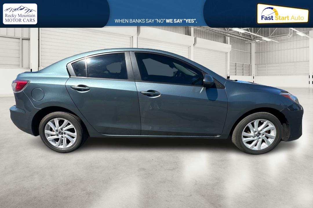 2013 Gray Mazda MAZDA3 i Touring MT 4-Door (JM1BL1V79D1) with an 2.0L L4 DOHC 16V engine, 5-Speed Manual transmission, located at 767 S State Road, Pleasant Grove, UT, 84062, (801) 785-1058, 40.354839, -111.736687 - Photo #1