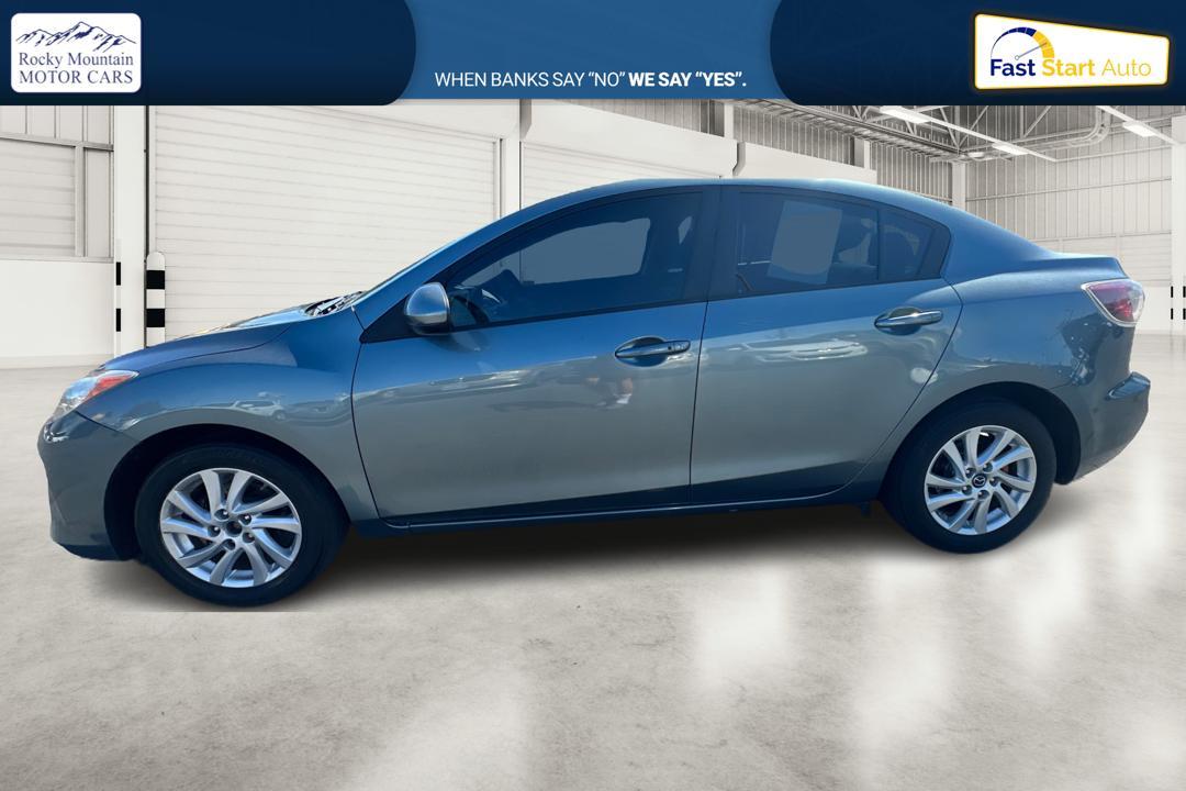2013 Gray Mazda MAZDA3 i Touring MT 4-Door (JM1BL1V79D1) with an 2.0L L4 DOHC 16V engine, 5-Speed Manual transmission, located at 767 S State Road, Pleasant Grove, UT, 84062, (801) 785-1058, 40.354839, -111.736687 - Photo #5