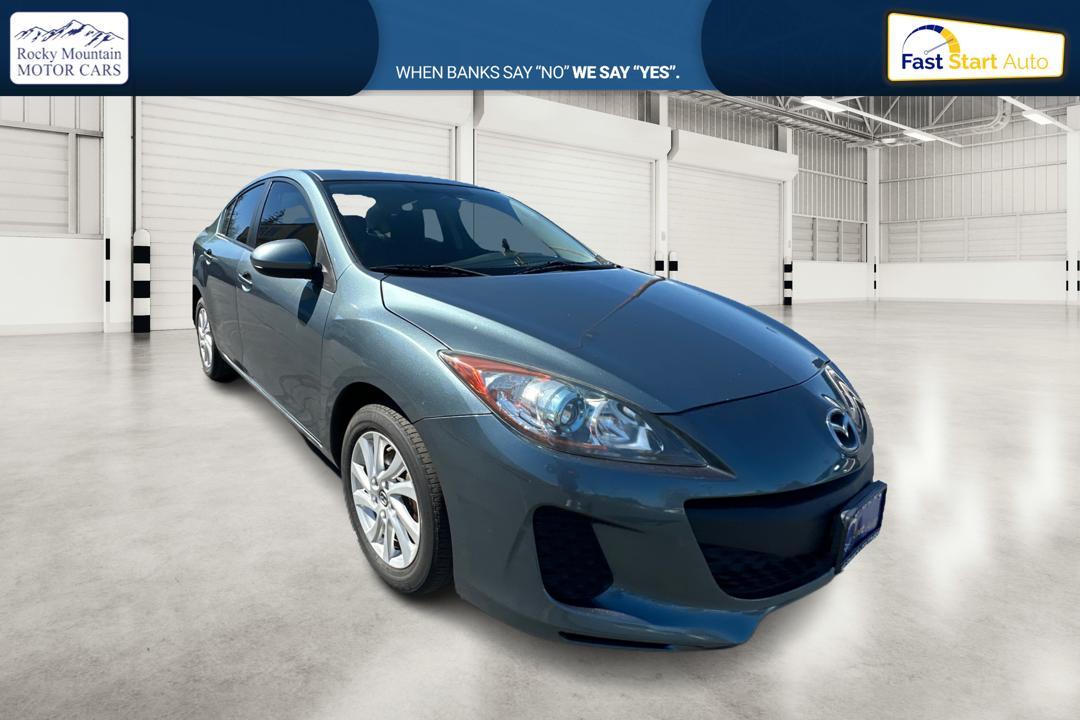 2013 Gray Mazda MAZDA3 i Touring MT 4-Door (JM1BL1V79D1) with an 2.0L L4 DOHC 16V engine, 5-Speed Manual transmission, located at 767 S State Road, Pleasant Grove, UT, 84062, (801) 785-1058, 40.354839, -111.736687 - Photo #0