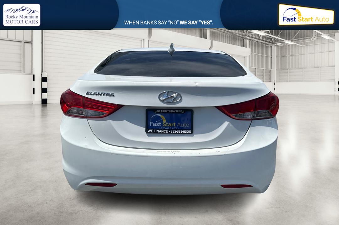 2013 White Hyundai Elantra Limited (5NPDH4AE7DH) with an 1.8L L4 DOHC 16V engine, 6-Speed Automatic transmission, located at 767 S State Road, Pleasant Grove, UT, 84062, (801) 785-1058, 40.354839, -111.736687 - Photo#4