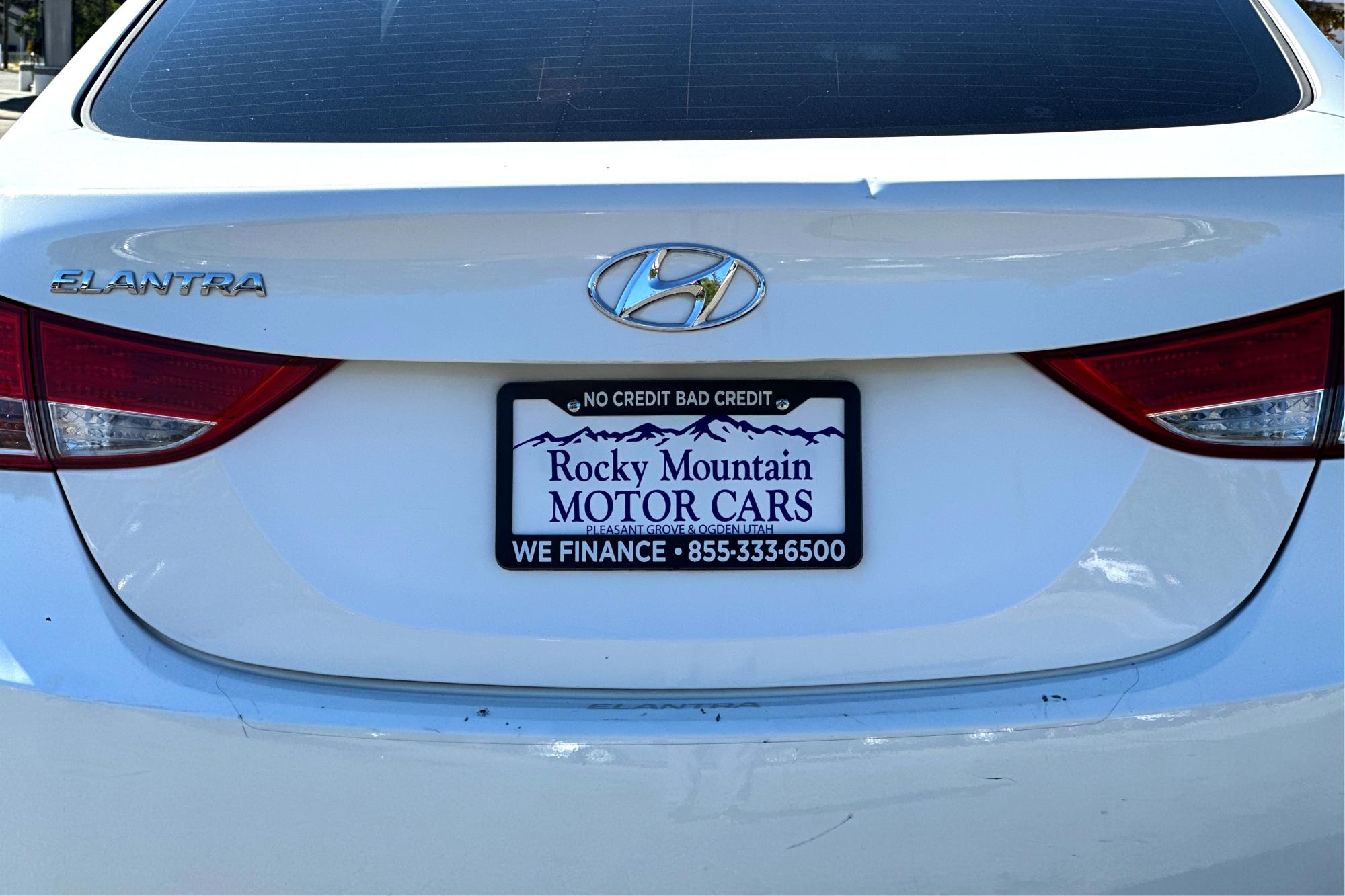 2013 White Hyundai Elantra Limited (5NPDH4AE7DH) with an 1.8L L4 DOHC 16V engine, 6-Speed Automatic transmission, located at 7755 State Street, Midvale, UT, 84047, (801) 753-9063, 40.610329, -111.890656 - Photo #10