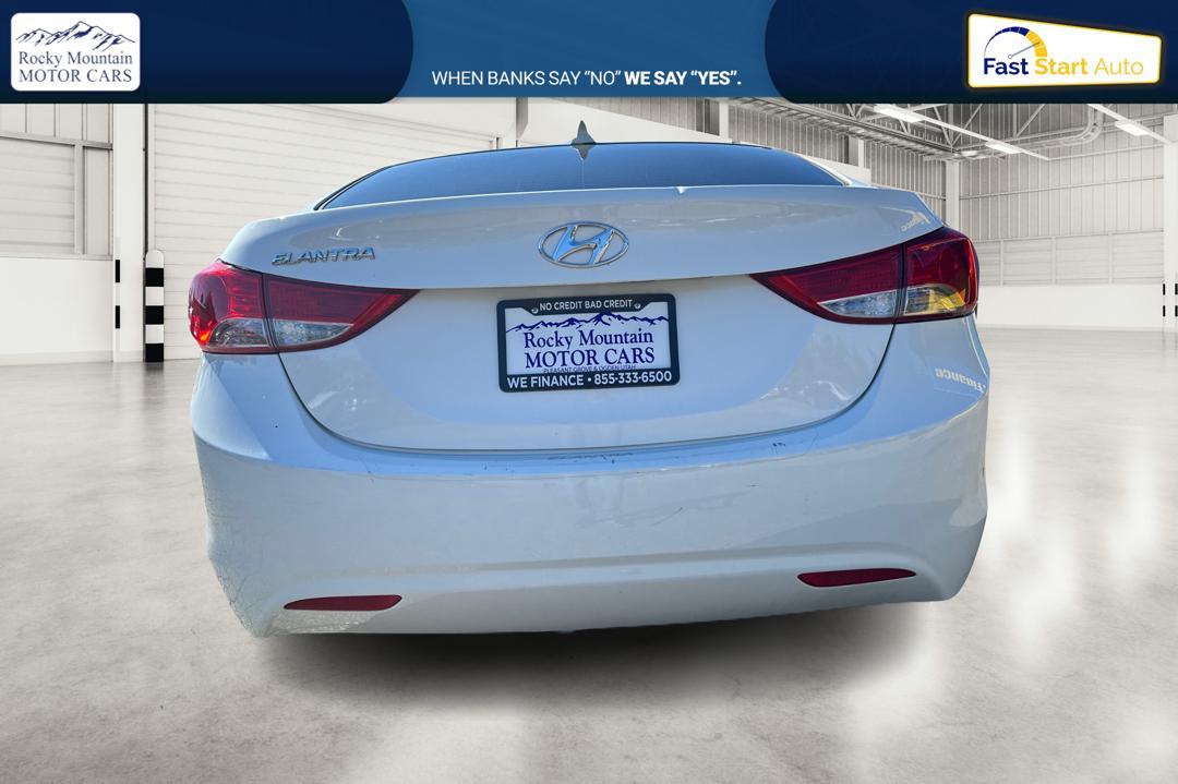 2013 White Hyundai Elantra Limited (5NPDH4AE7DH) with an 1.8L L4 DOHC 16V engine, 6-Speed Automatic transmission, located at 7755 State Street, Midvale, UT, 84047, (801) 753-9063, 40.610329, -111.892159 - Photo #3