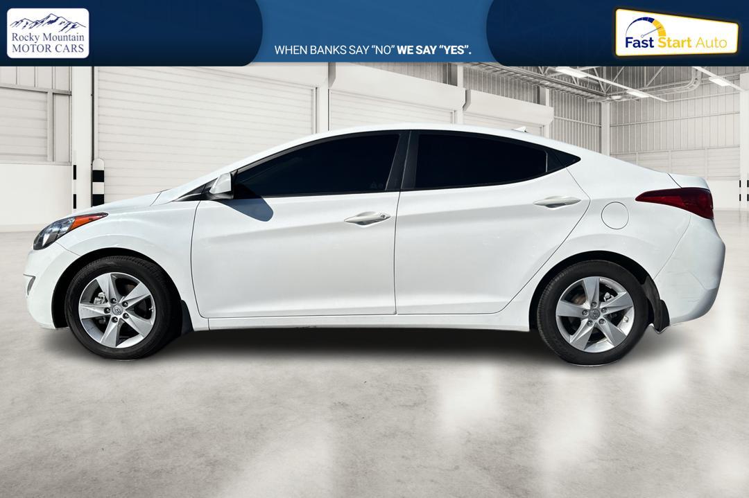 2013 White Hyundai Elantra Limited (5NPDH4AE7DH) with an 1.8L L4 DOHC 16V engine, 6-Speed Automatic transmission, located at 7755 State Street, Midvale, UT, 84047, (801) 753-9063, 40.610329, -111.890656 - Photo #5