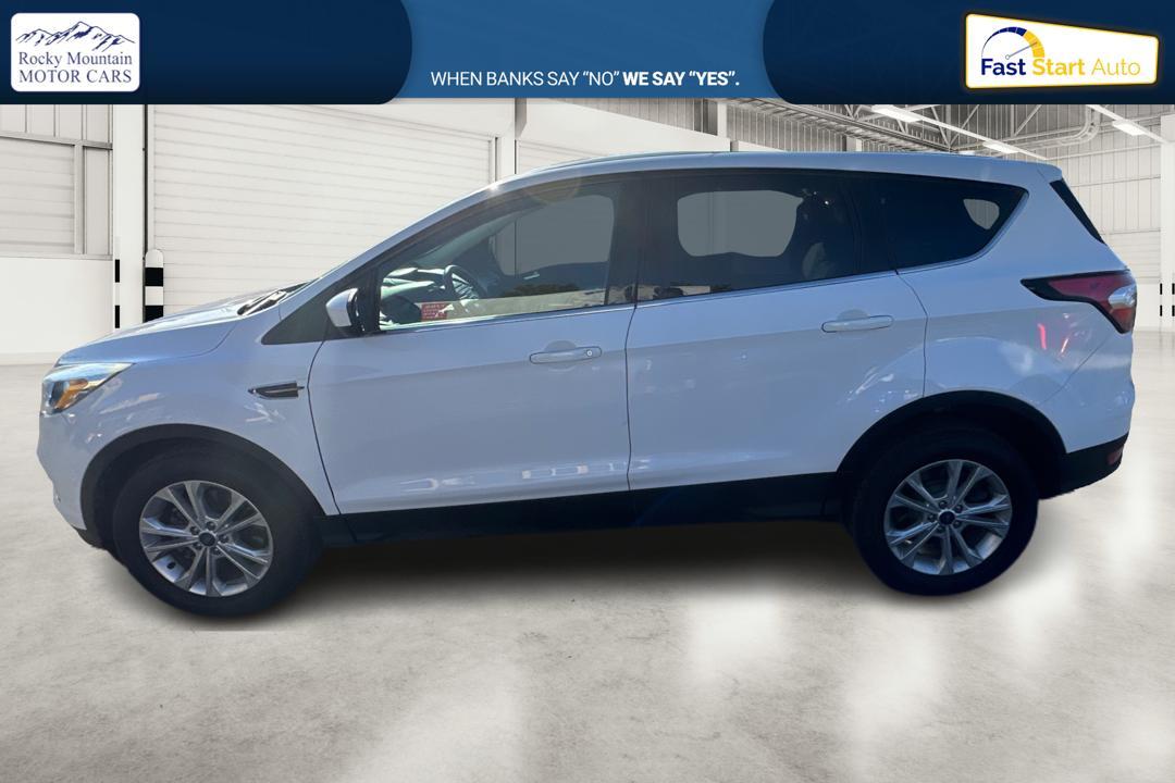 2017 White Ford Escape SE 4WD (1FMCU9GD3HU) with an 1.5L L4 DOHC 16V engine, 6A transmission, located at 7755 State Street, Midvale, UT, 84047, (801) 753-9063, 40.610329, -111.892159 - Photo #5