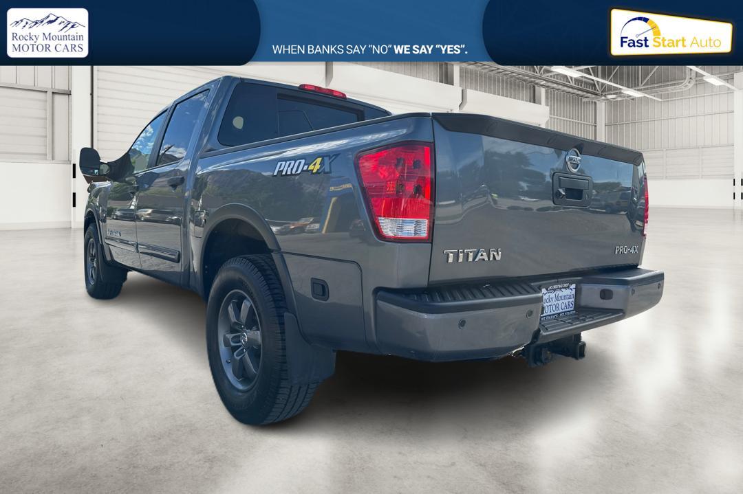 2015 Gray Nissan Titan PRO-4X Crew Cab 4WD SWB (1N6AA0ECXFN) with an 5.6L V8 DOHC 32V engine, 5-Speed Automatic transmission, located at 344 S Washington Blvd, Ogden, UT, 84404, (801) 399-1799, 41.255482, -111.970848 - Photo #4