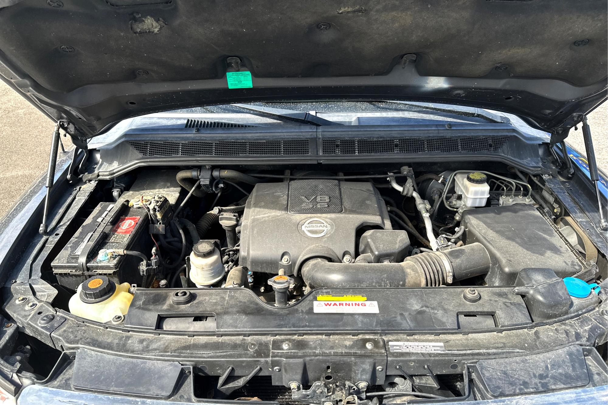 2015 Gray Nissan Titan PRO-4X Crew Cab 4WD SWB (1N6AA0ECXFN) with an 5.6L V8 DOHC 32V engine, 5-Speed Automatic transmission, located at 344 S Washington Blvd, Ogden, UT, 84404, (801) 399-1799, 41.255482, -111.970848 - Photo #8