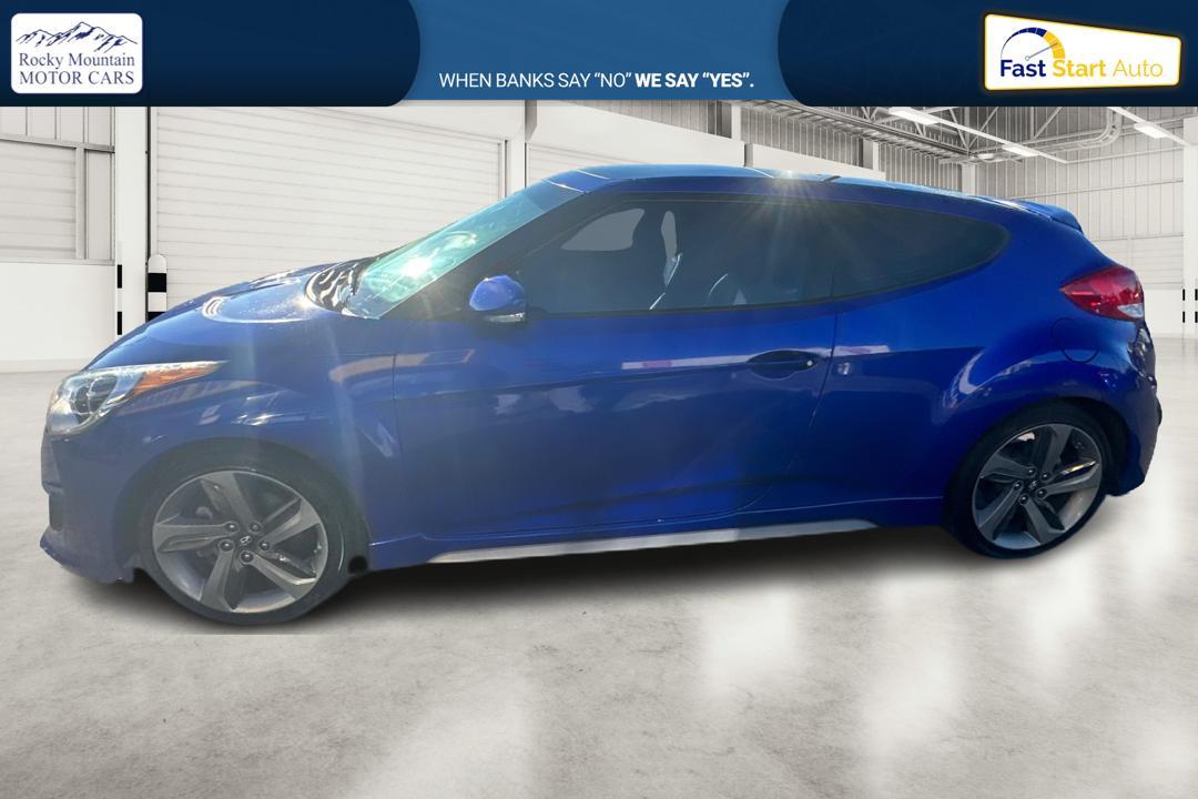 2015 Blue Hyundai Veloster Turbo 6AT (KMHTC6AE6FU) with an 1.6L L4 DOHC 16V TURBO engine, 6-Speed Automatic transmission, located at 767 S State Road, Pleasant Grove, UT, 84062, (801) 785-1058, 40.354839, -111.736687 - Photo #5